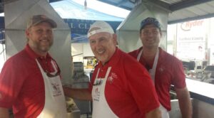 Derek Raborn, Wayne Blair and Baker Raborn serve as cooks at the Smyrna Rotary Club’s annual Wings Of Freedom Fish Fry in Smyrna